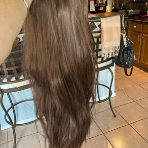 Long, silky soft brownish-blond wig.